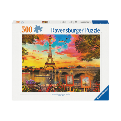 En Kveld i Paris 500 brikker Ravensburger puslespill eske med Eiffeltårnet og solnedgang motiv