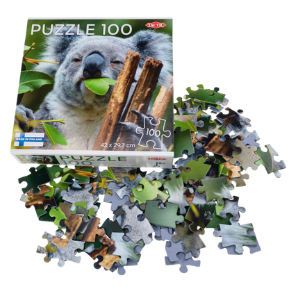 Koala at Lone Pine puslespill eske med usorterte puslespillbrikker spredt rundt