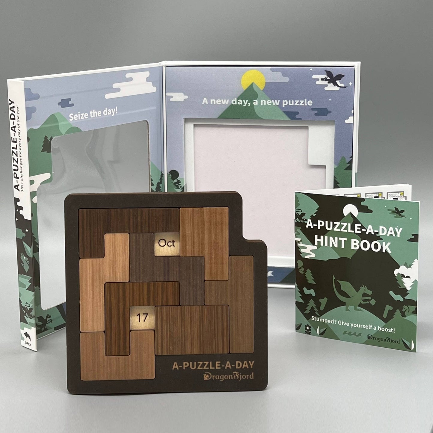 A-Puzzle-A-Day Deluxe komplett sett med magnetboks, puslespill og hintbok